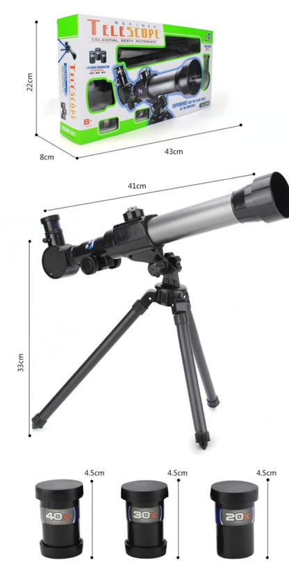 Telescope with tripod and accessories, including a box, on a white background with measurements.